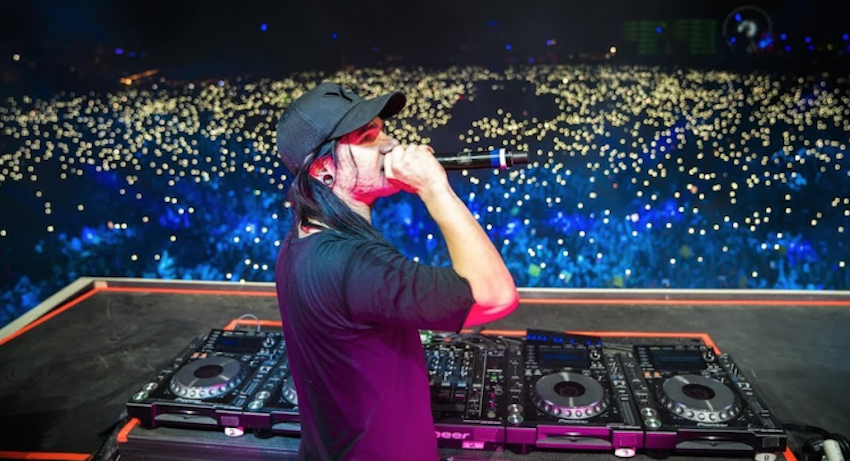 Skrillex performing live on stage